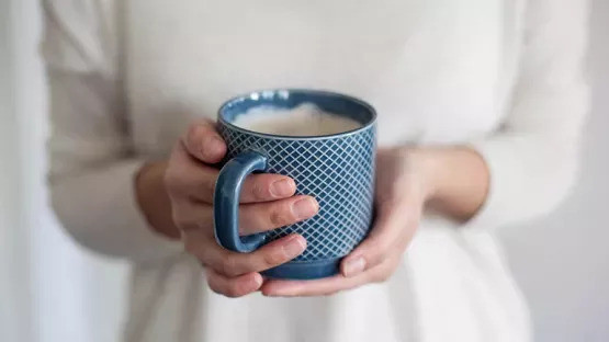 A cup of formula milk for pregnancy